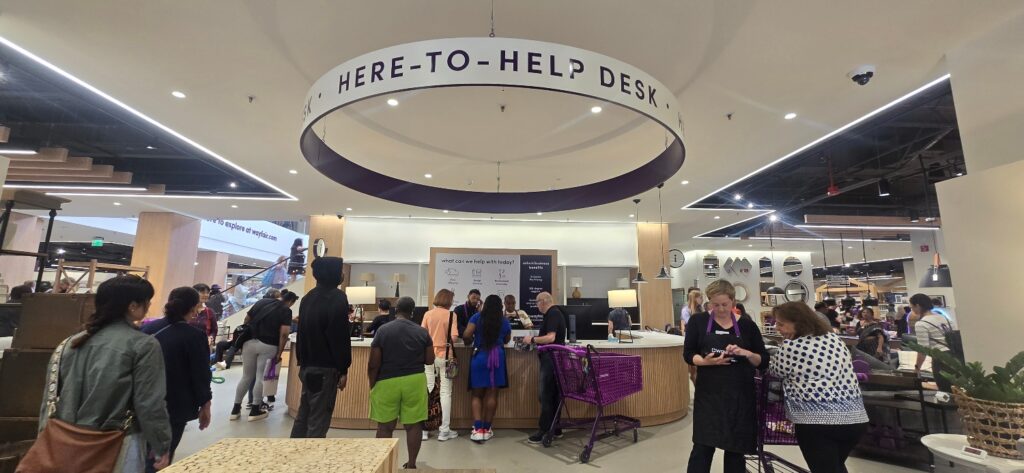 shoppers at a customer service desk
